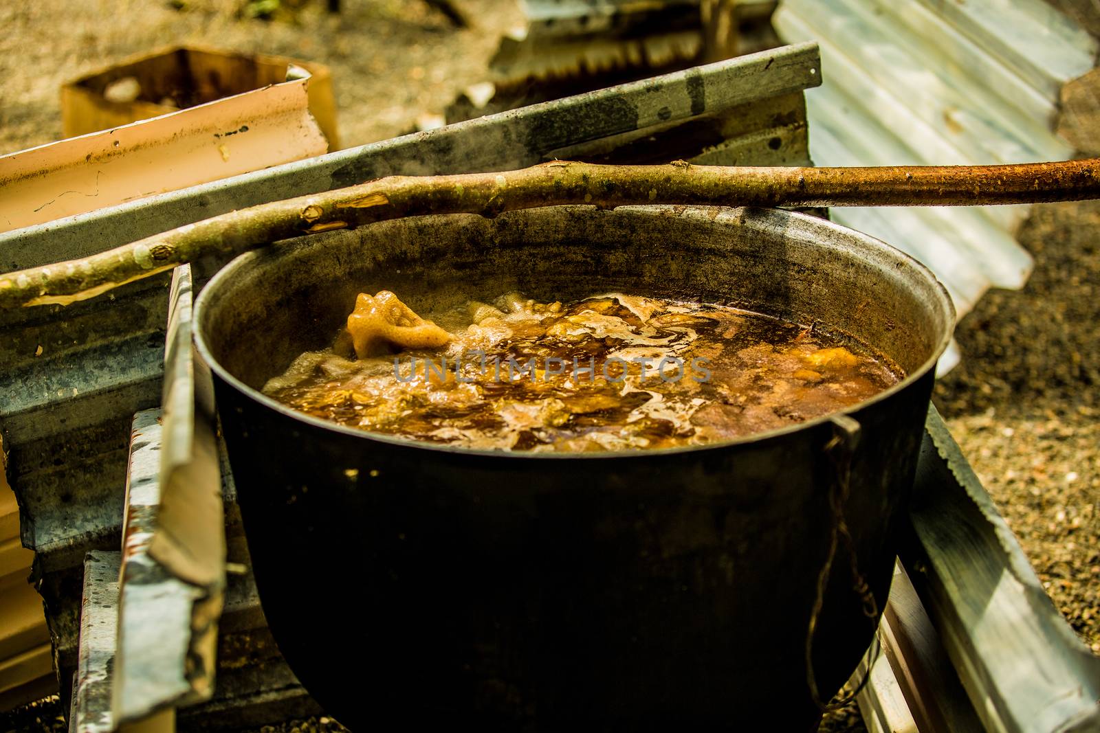 Cooking goulash outdoors by sarymsakov