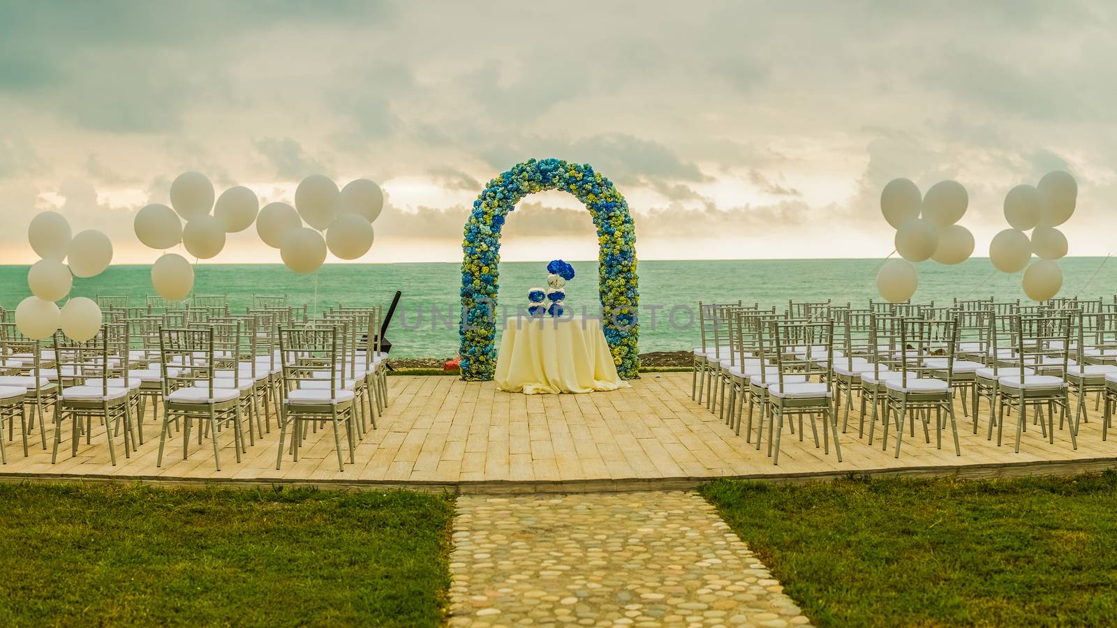 beach wedding set up, outdoor wedding reception, wedding arch