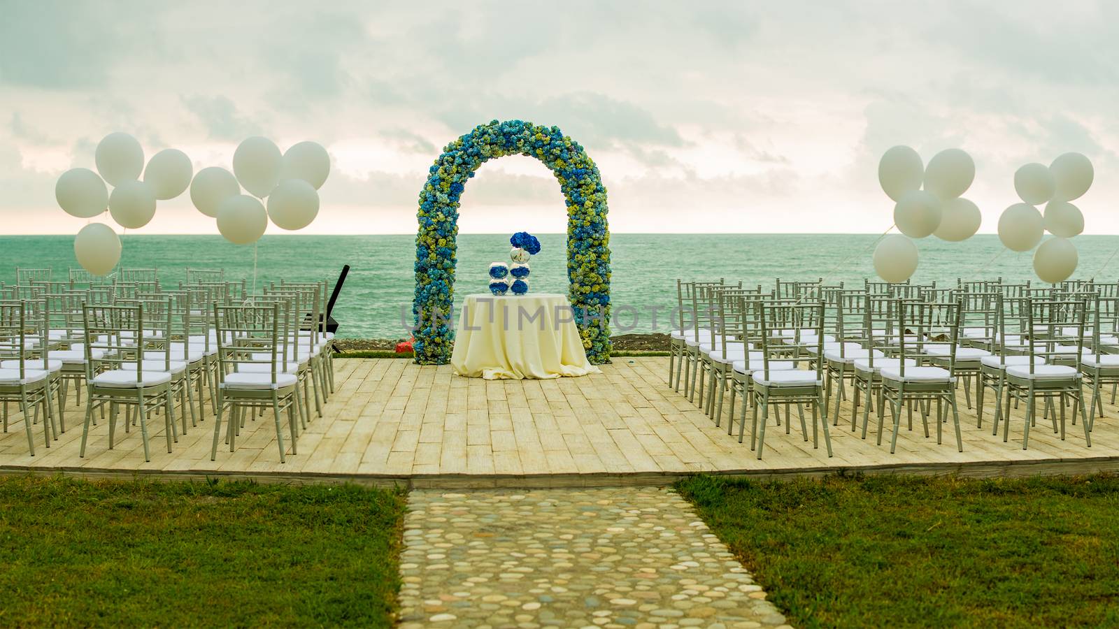 beach wedding set up, outdoor wedding reception, wedding arch