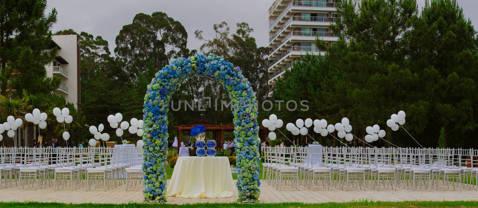 beach wedding set up, outdoor wedding reception, wedding arch