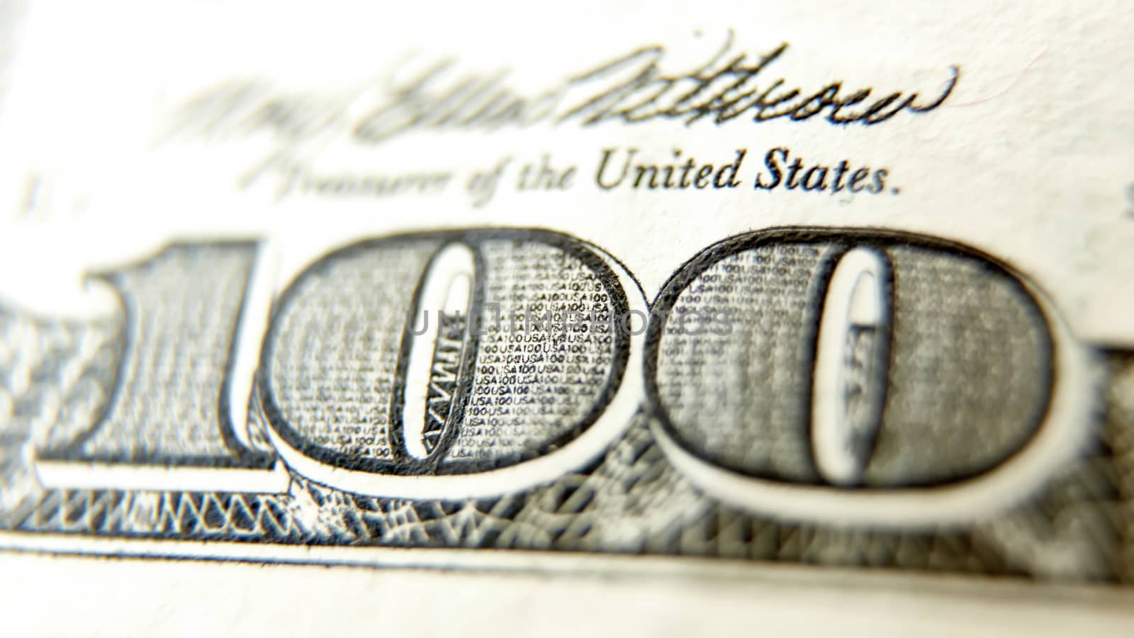 Macro close up of the US 100 dollar bill by sarymsakov