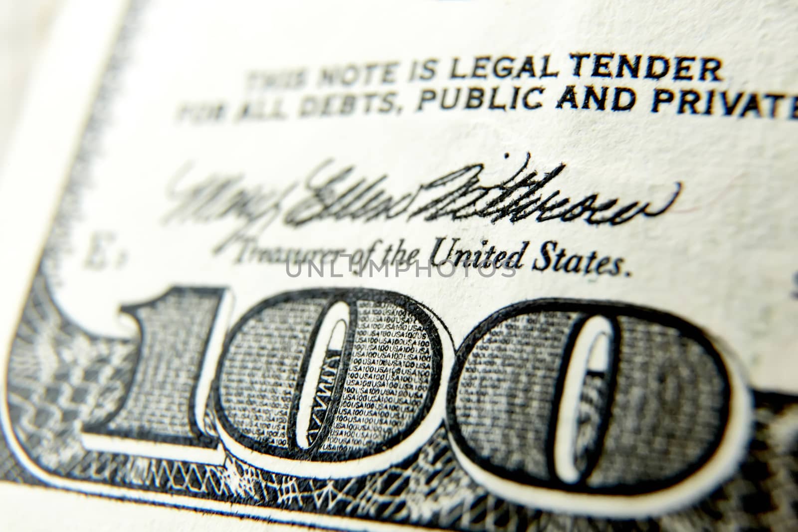 Macro close up of the US 100 dollar bill by sarymsakov