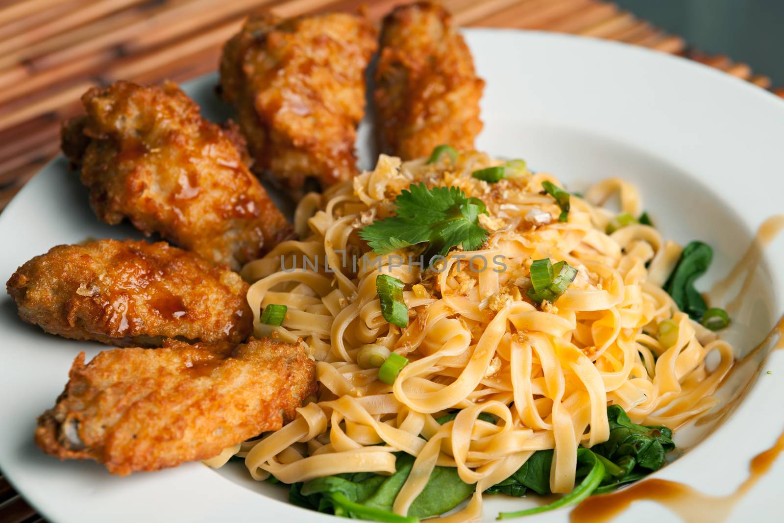 Chicken Wings with Noodles and Spinach by graficallyminded