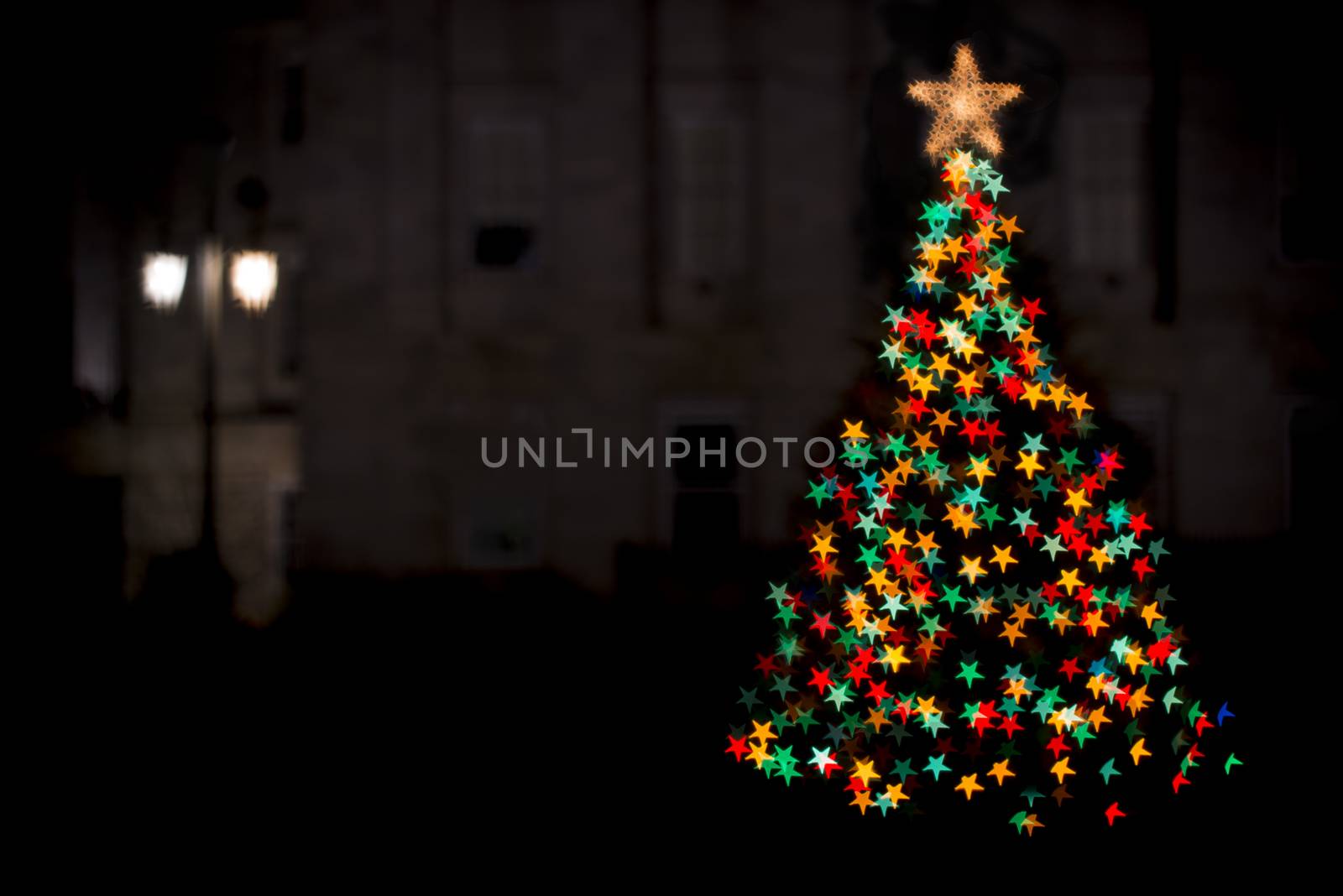 softly focused and blurred holiday and christmas lights on a christmas tree