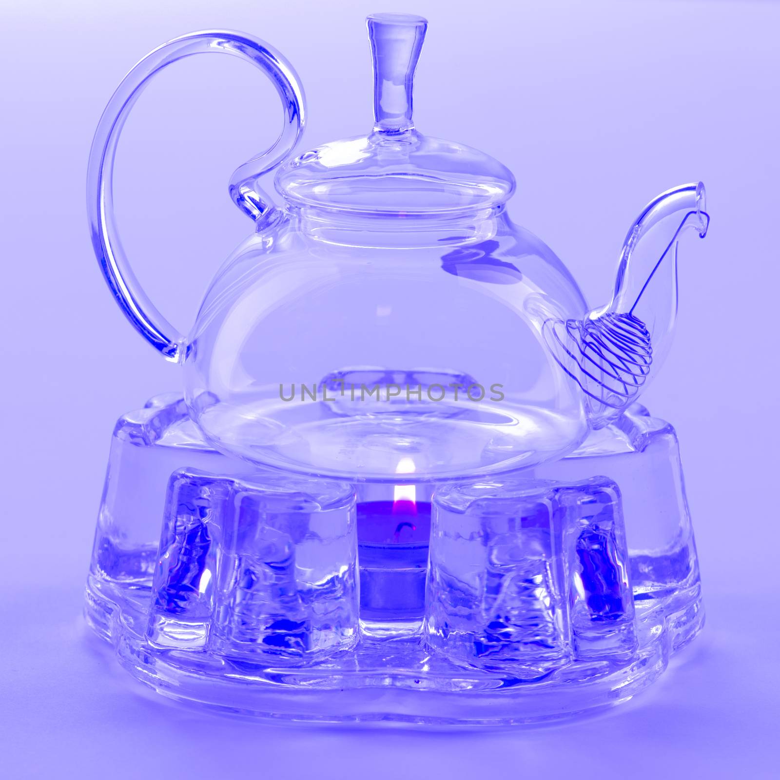 Isolated Tea Pot from glass on the table