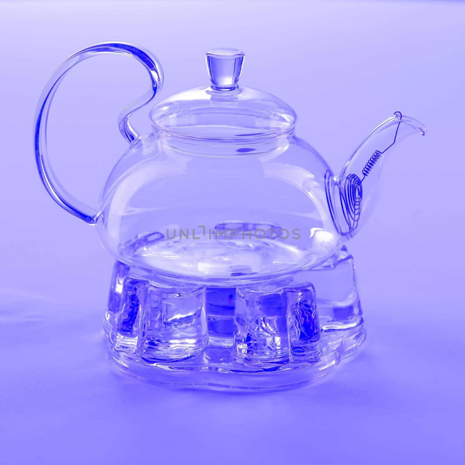 Isolated Tea Pot from glass on the table