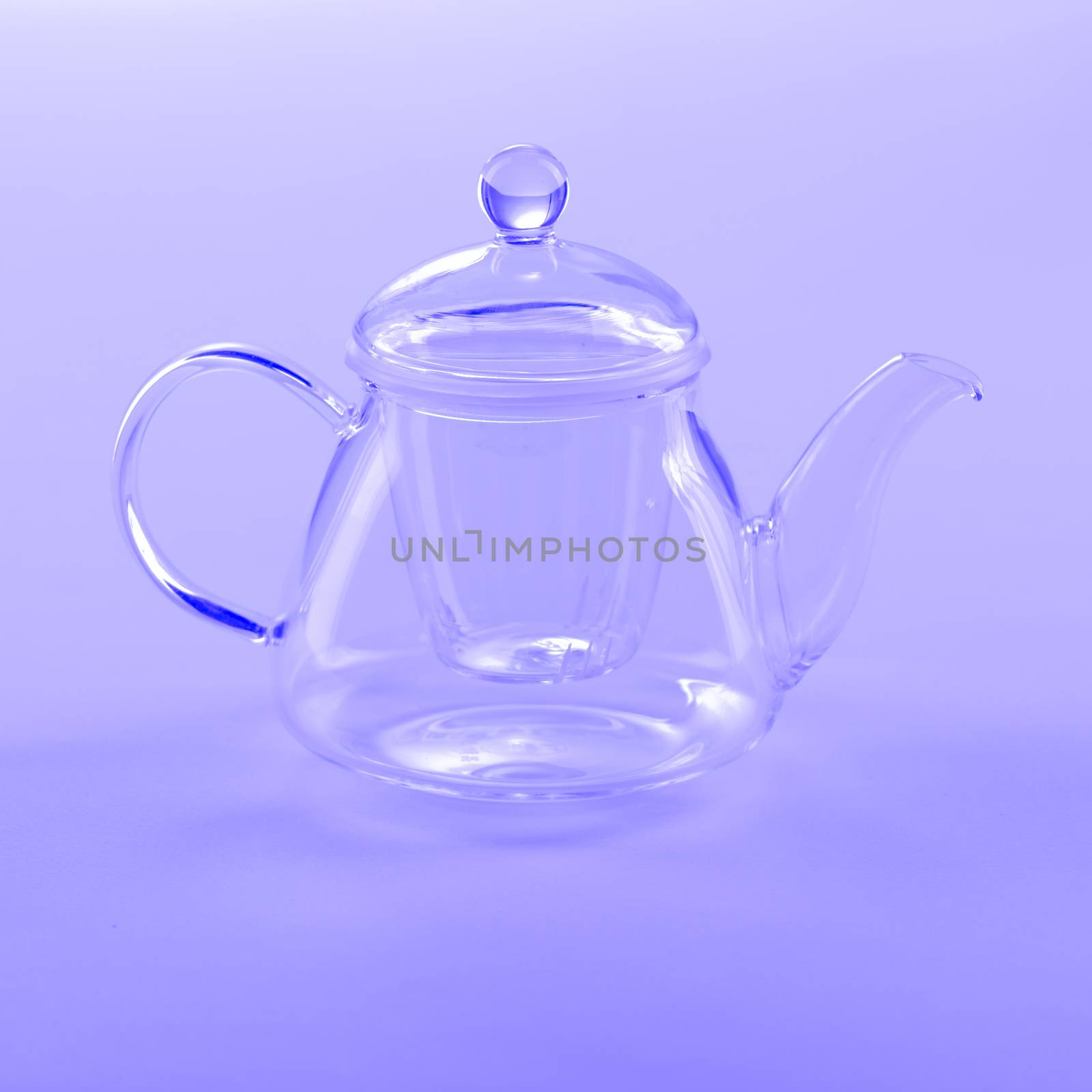 Isolated Tea Pot from glass on the table