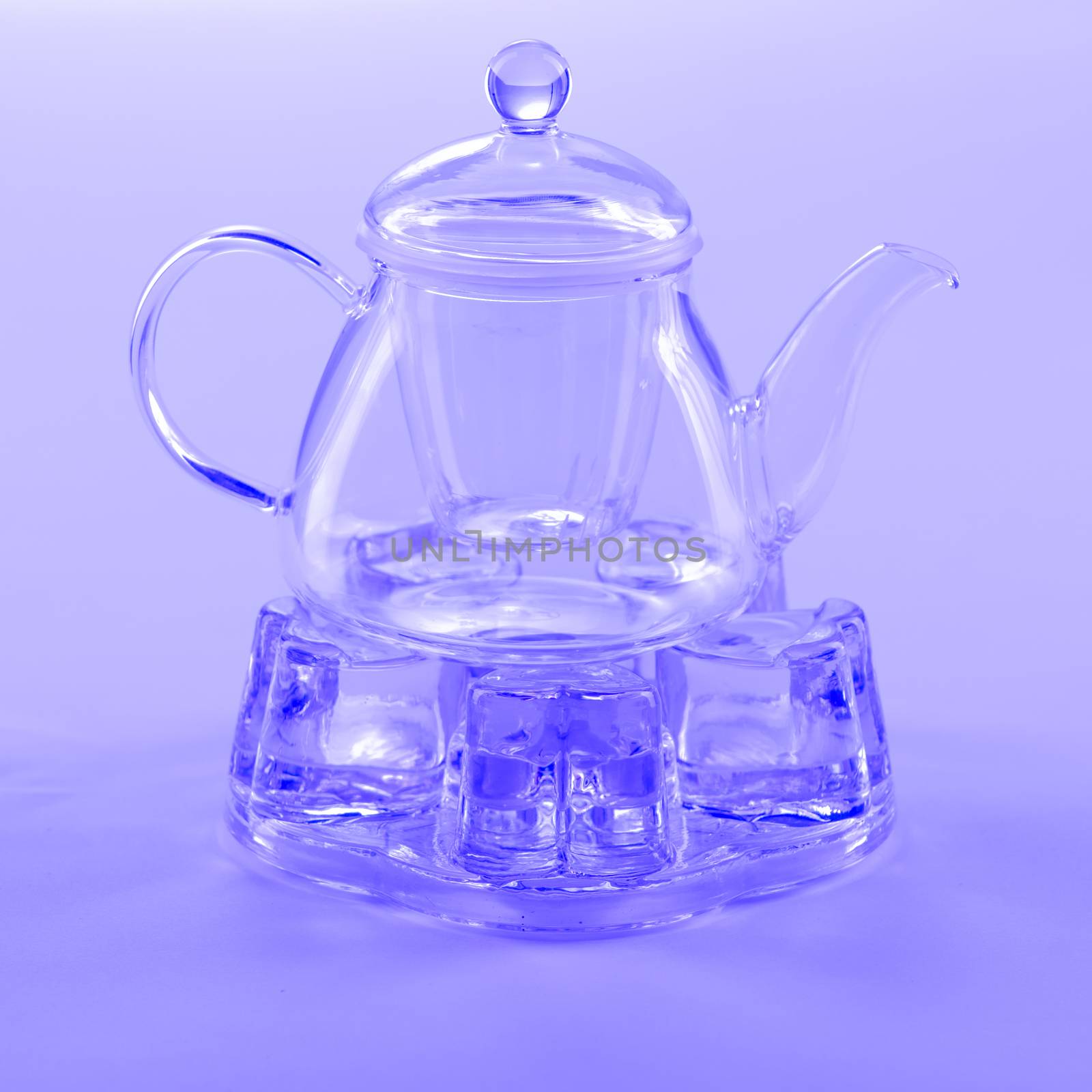 Isolated Tea Pot from glass on the table
