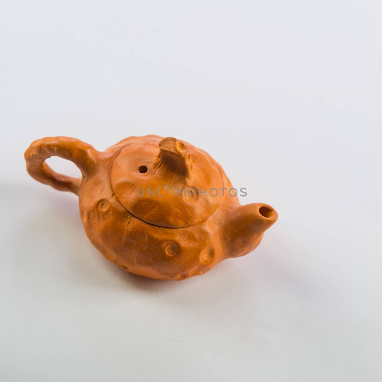 Isolated Tea Pot from glass on the table