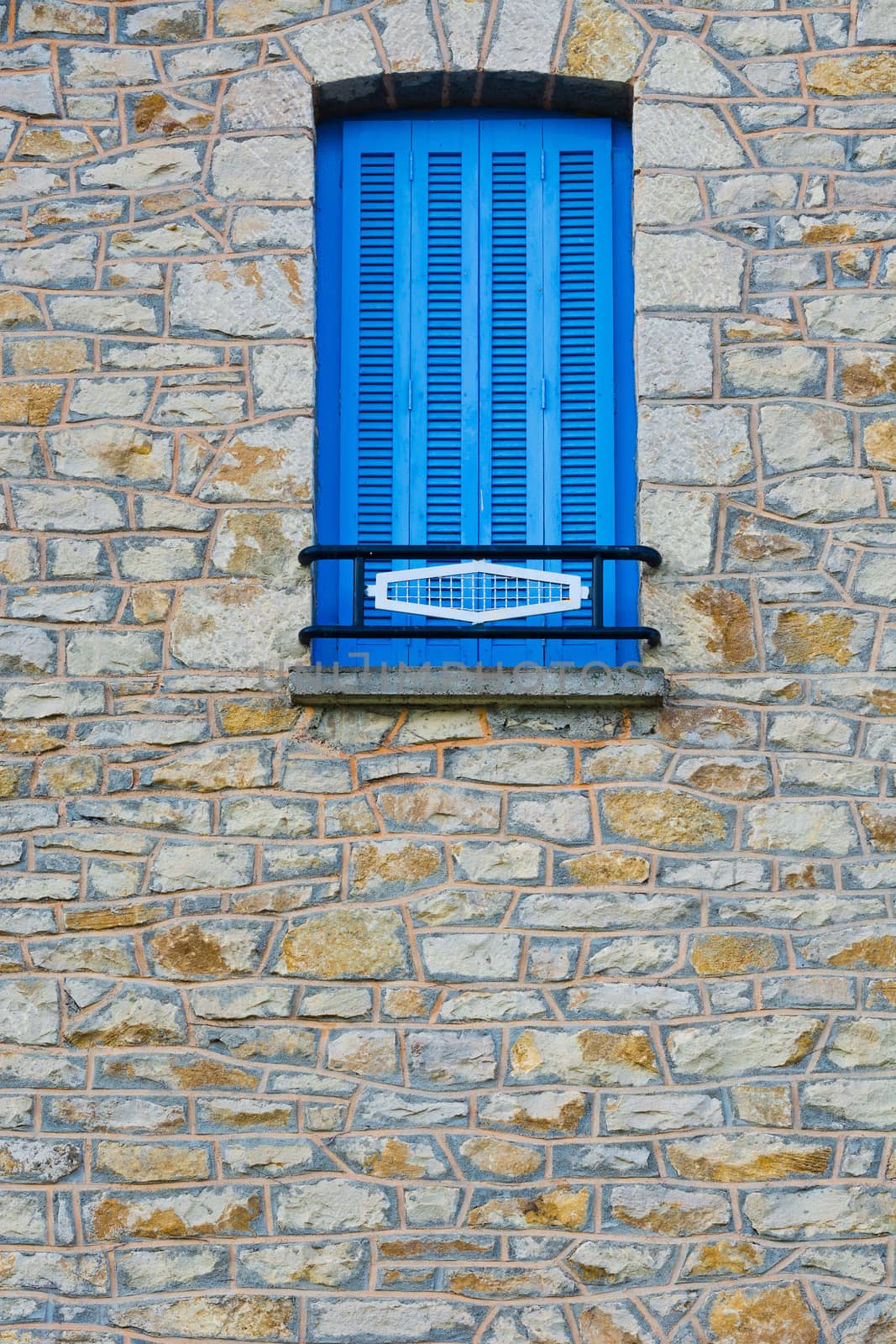 French Window with Closed Wooden Shutter