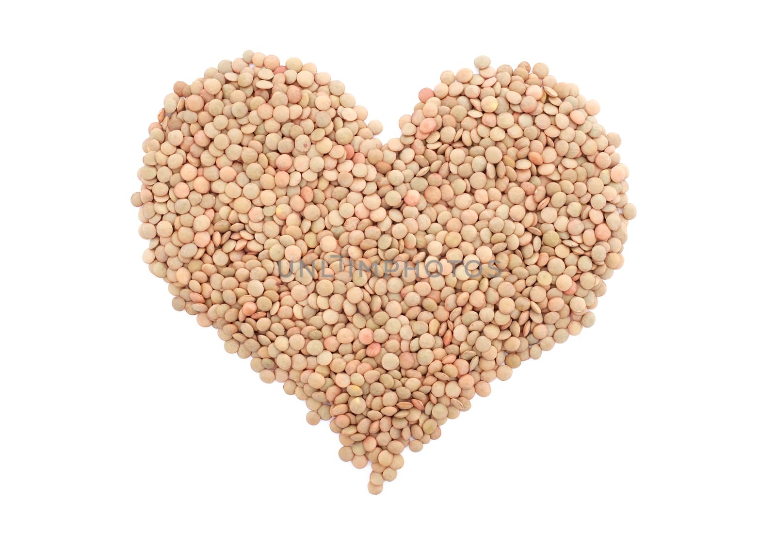 Green lentils in a heart shape, isolated on a white background