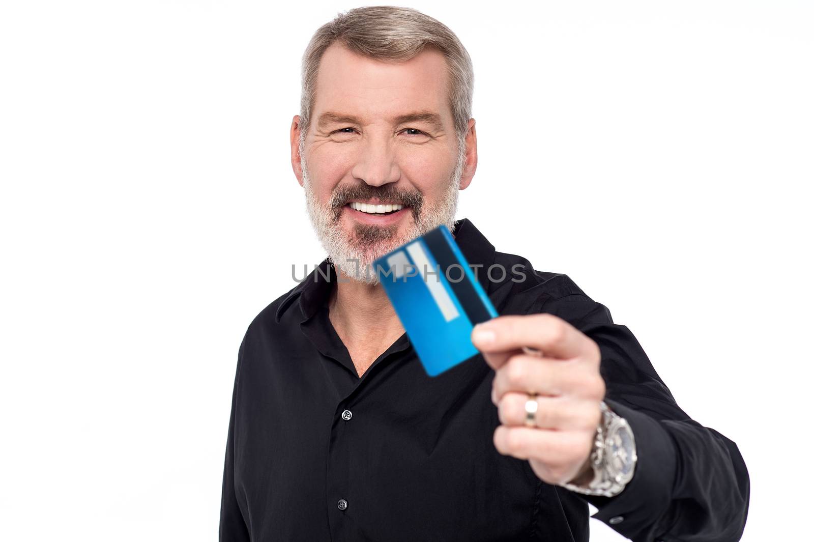 Senior man showing his credit card to camera