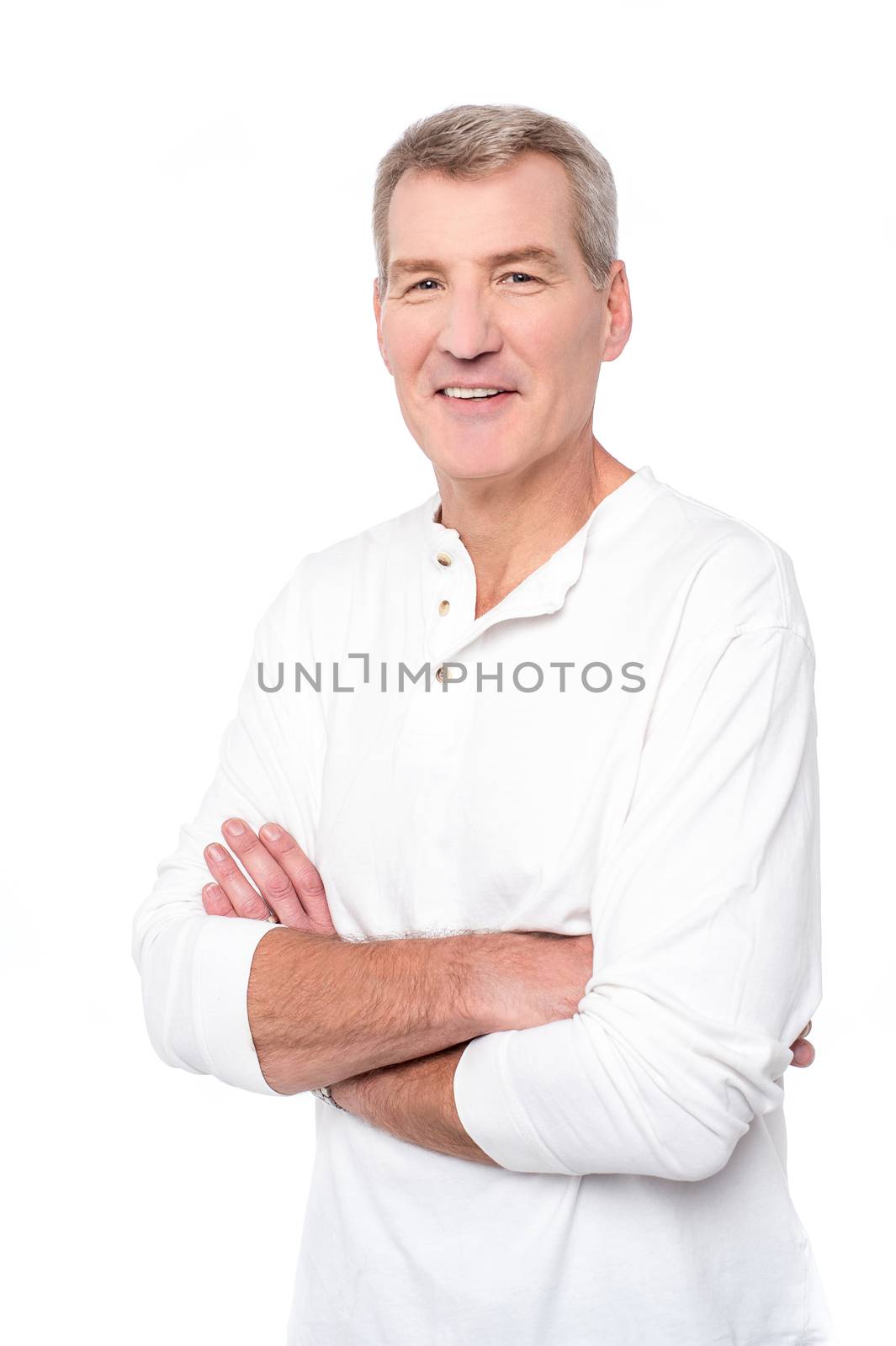 Handsome mature man isolated over white with arms crossed
