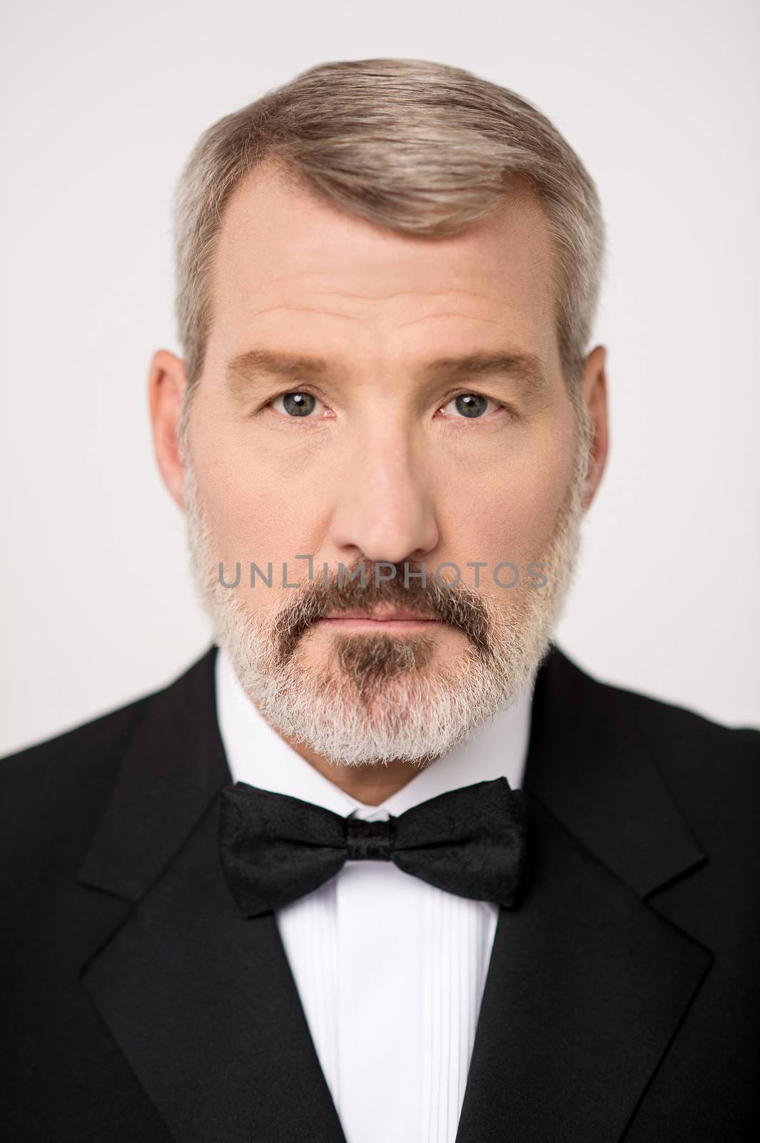 Mature man posing to camera by stockyimages