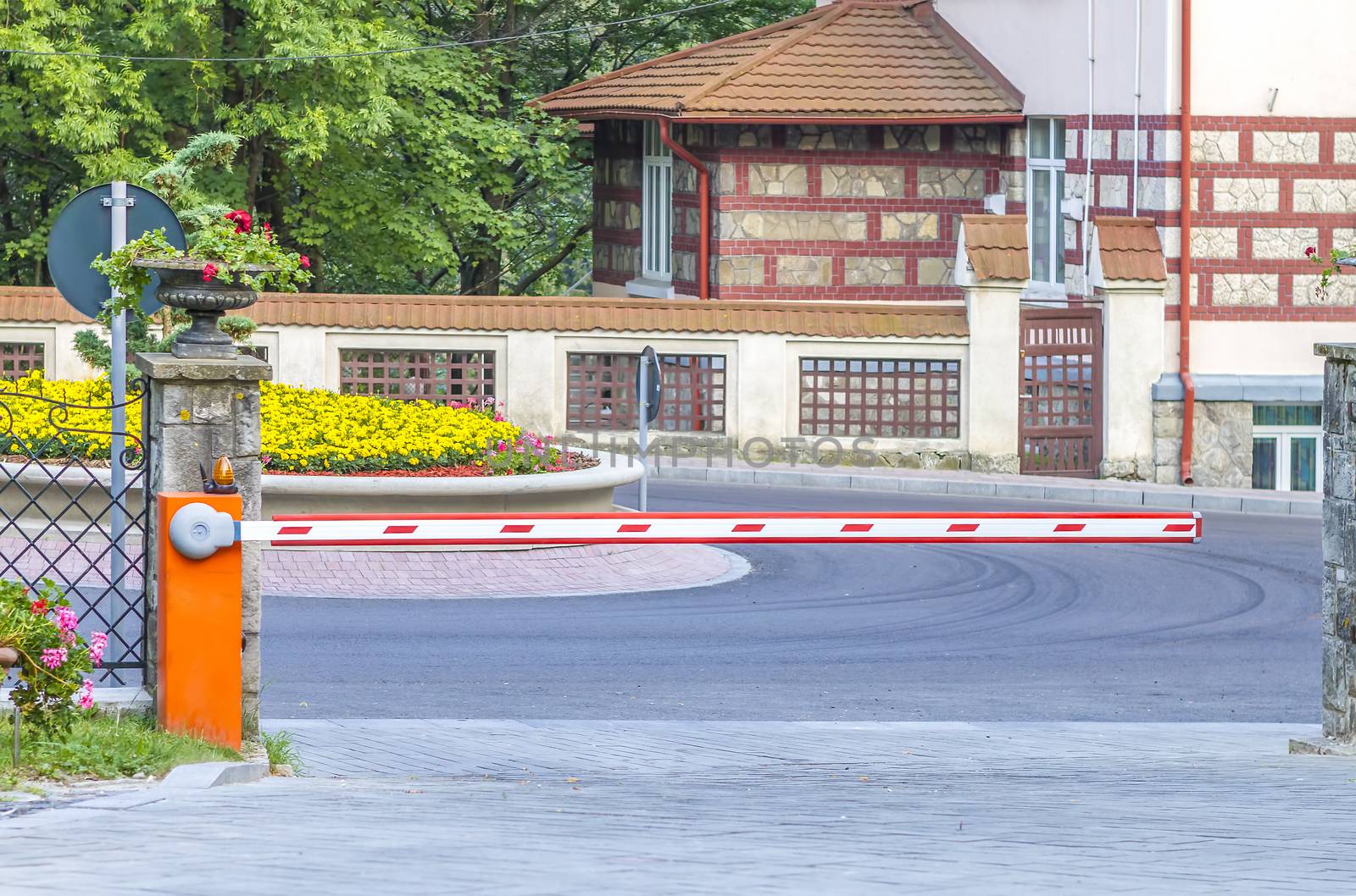 Barrier of a hotels parking lot by manaemedia