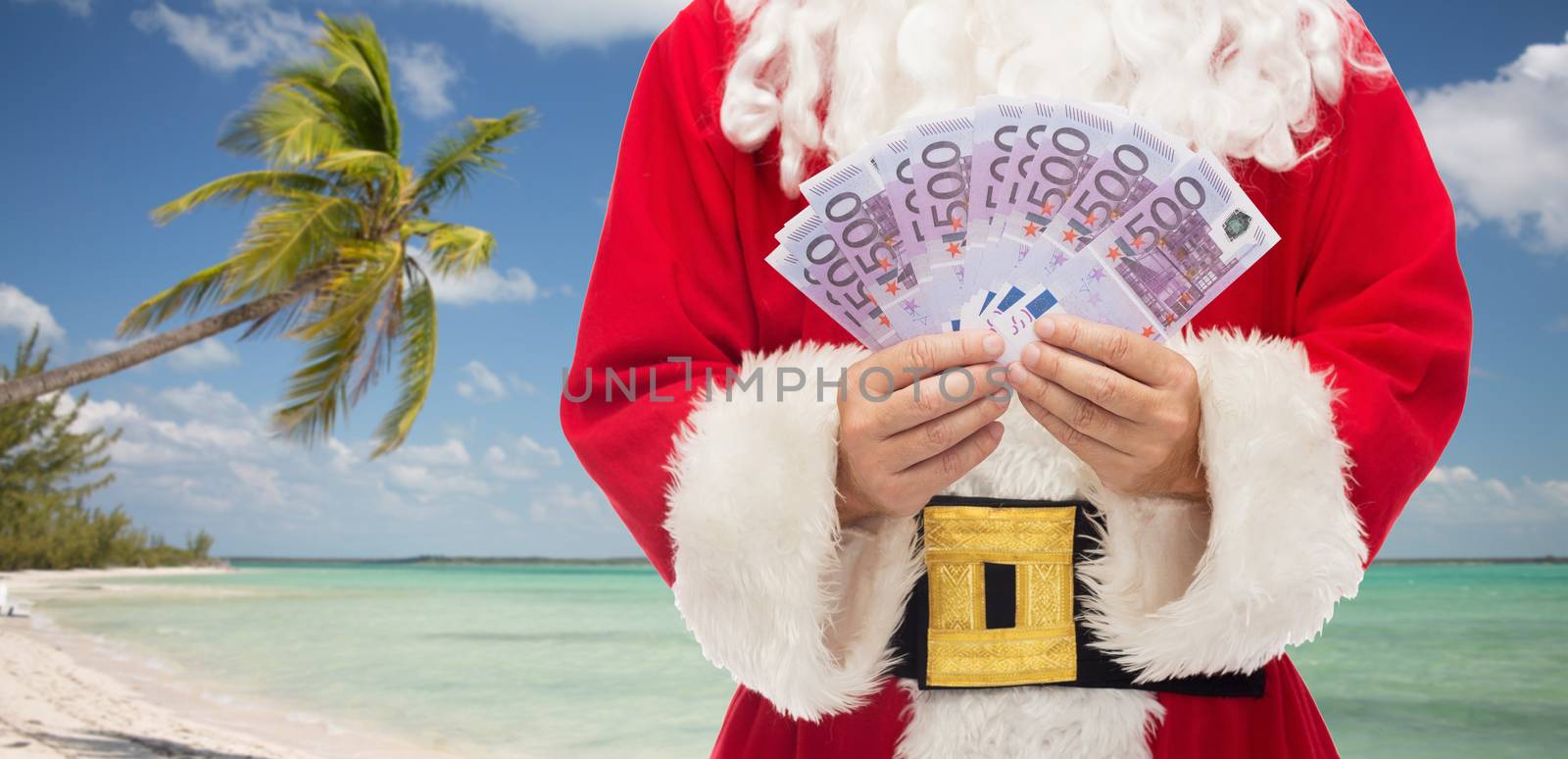 close up of santa claus with euro money by dolgachov