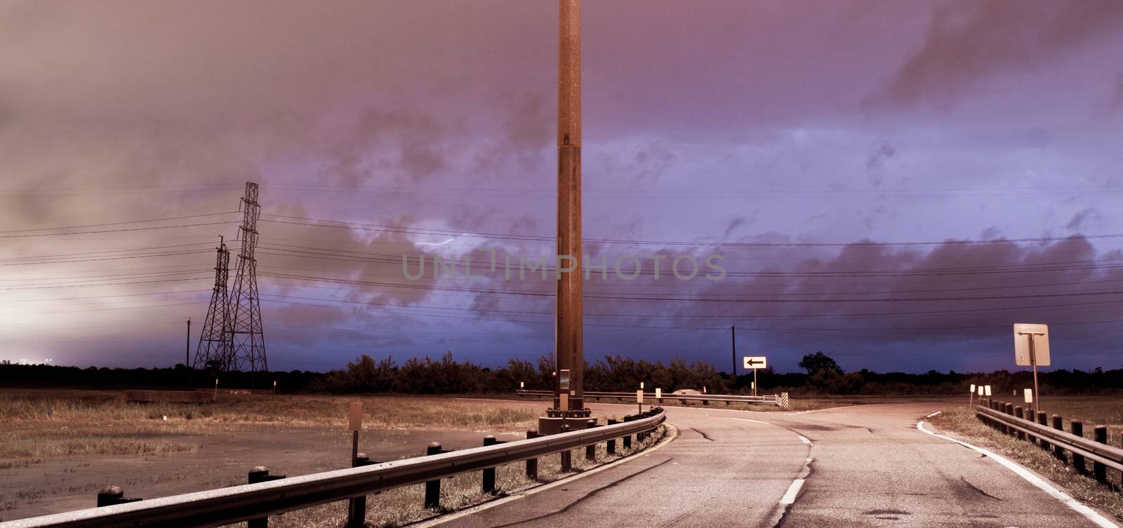 Lightning Strkes over a road in southeast Texas