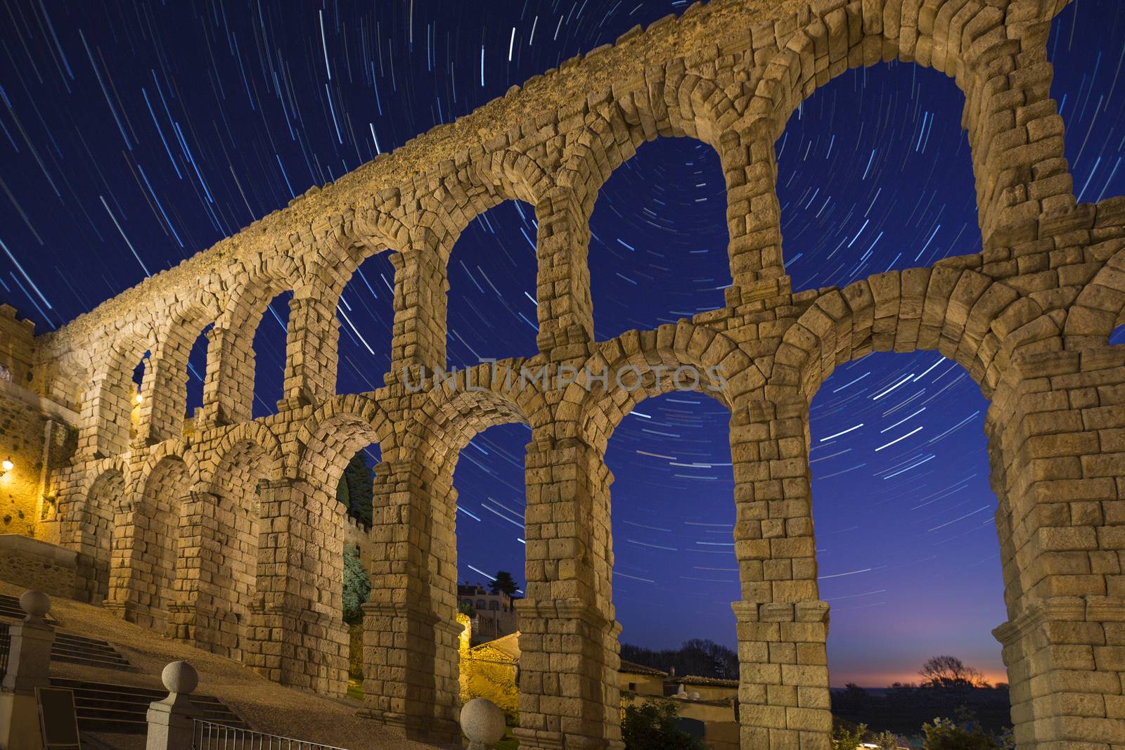 Astronomy - Star Trails and the Roman Aqueduct in the city of Segovia in the Castila-y-Leon region of central Spain.