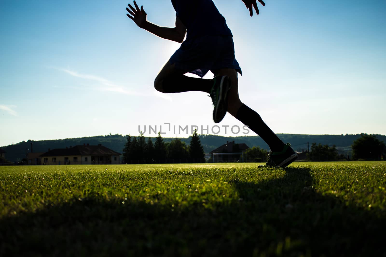 Runner training on a stadium