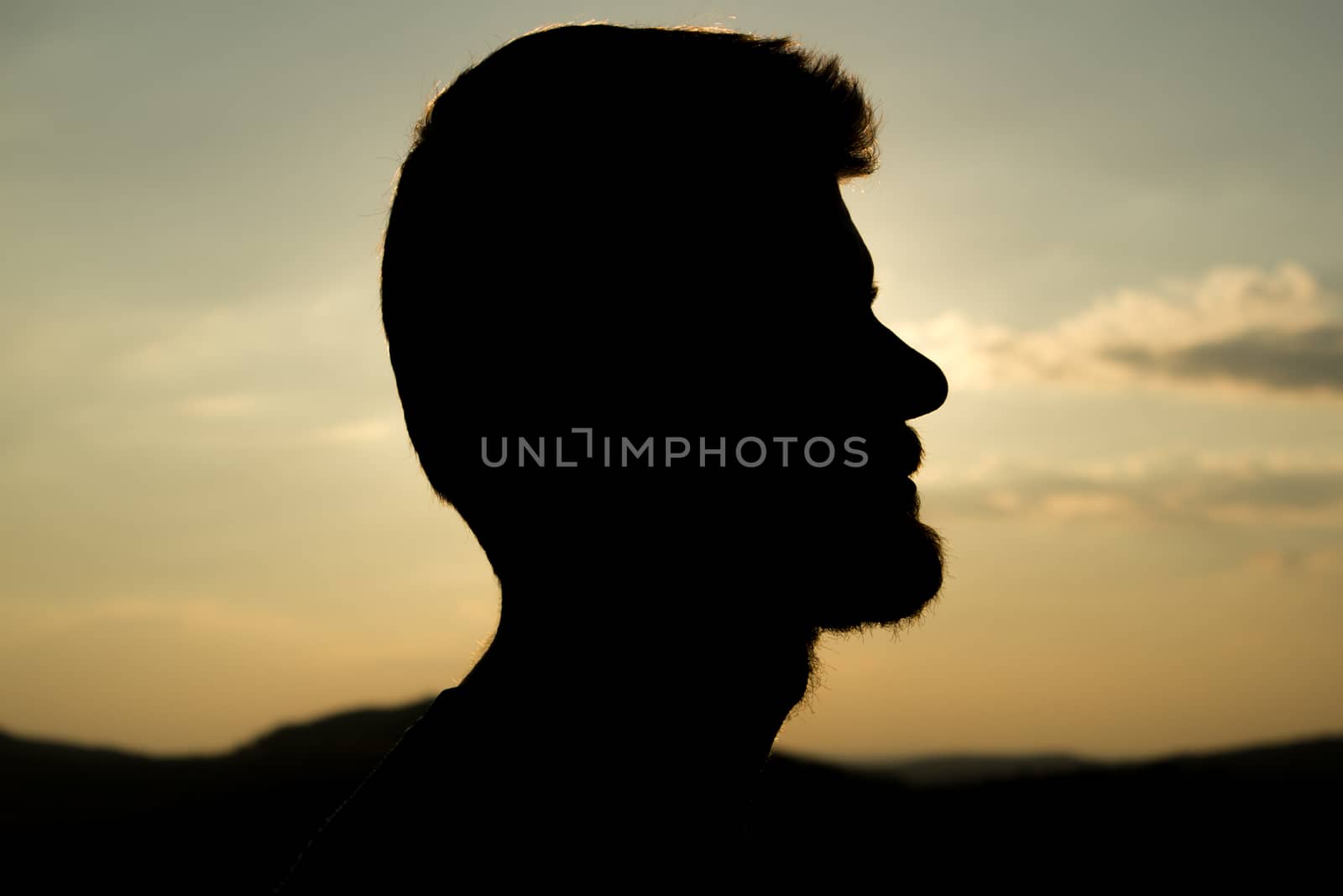 Silhouette portrait made in sunset light