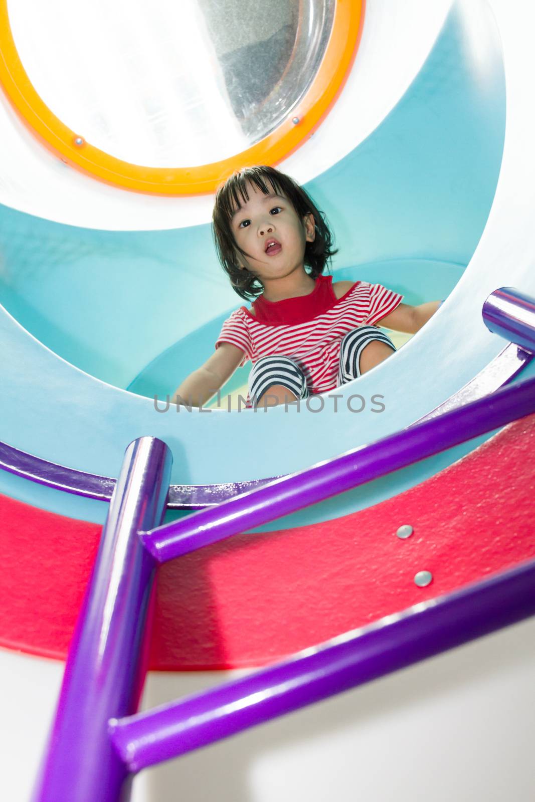 Asian Chinese Girl having funtime at Playground.