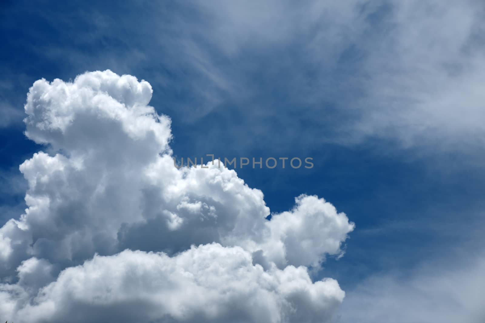 Beautiful rainclouds in the blue sky at Chiangmai city, Northern Thailand.