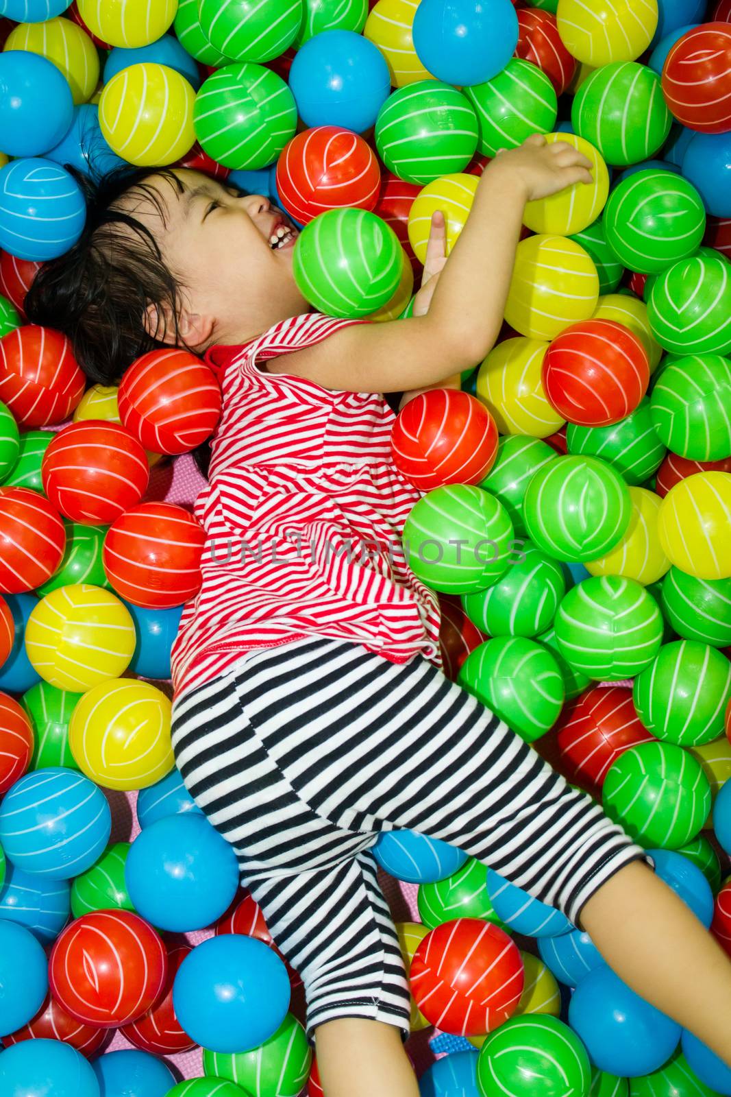 Asian Chinese Girl In Ball Pool by kiankhoon