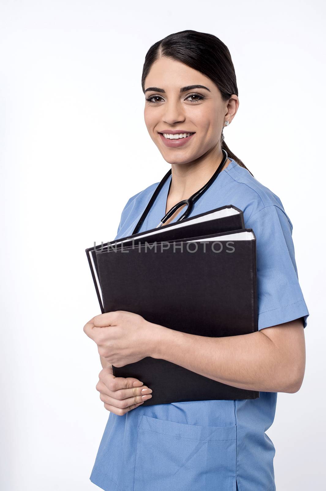 Beautiful female physician with black file folders