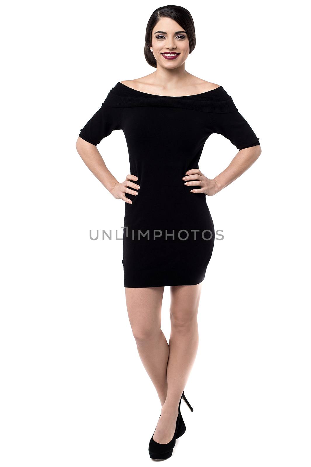 Full length of smiling woman in party wear