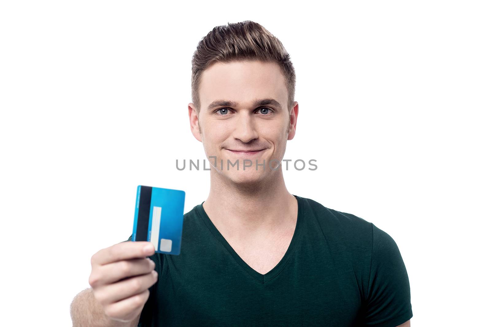Happy male offering his credit card by stockyimages