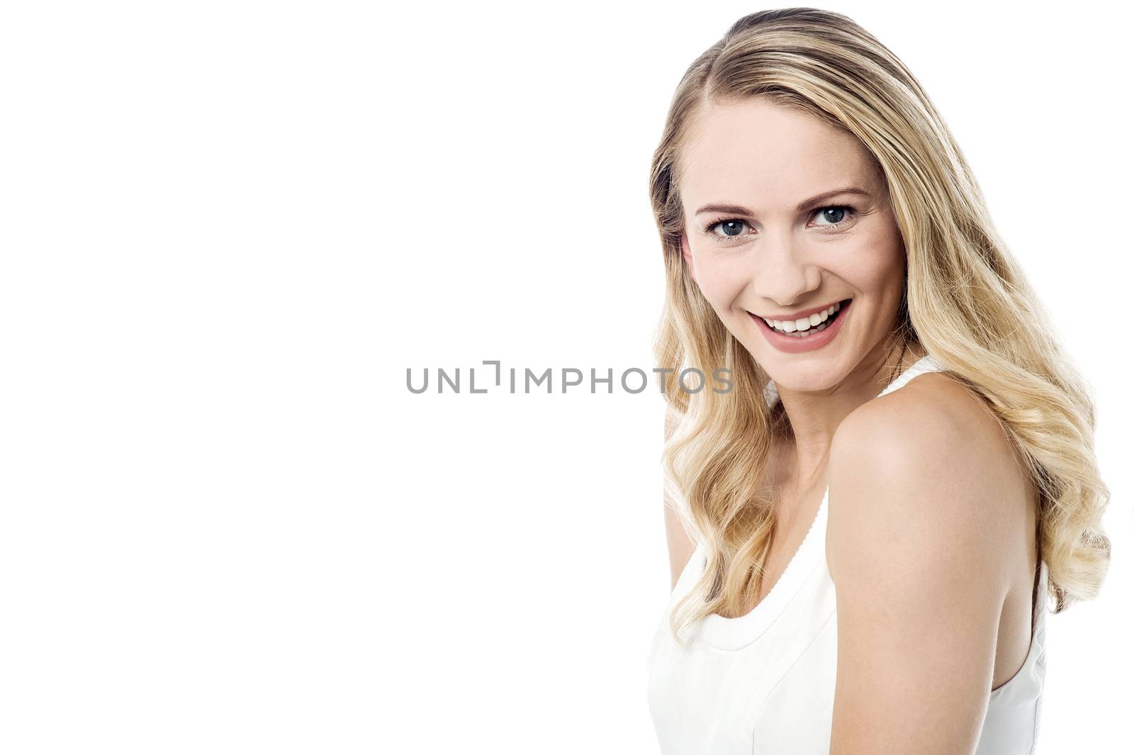 Image of a beautiful young girl posing over white