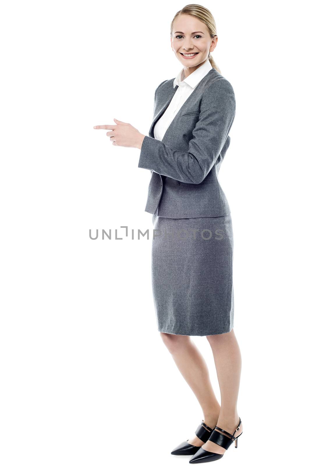 Female executive showing empty copy space
