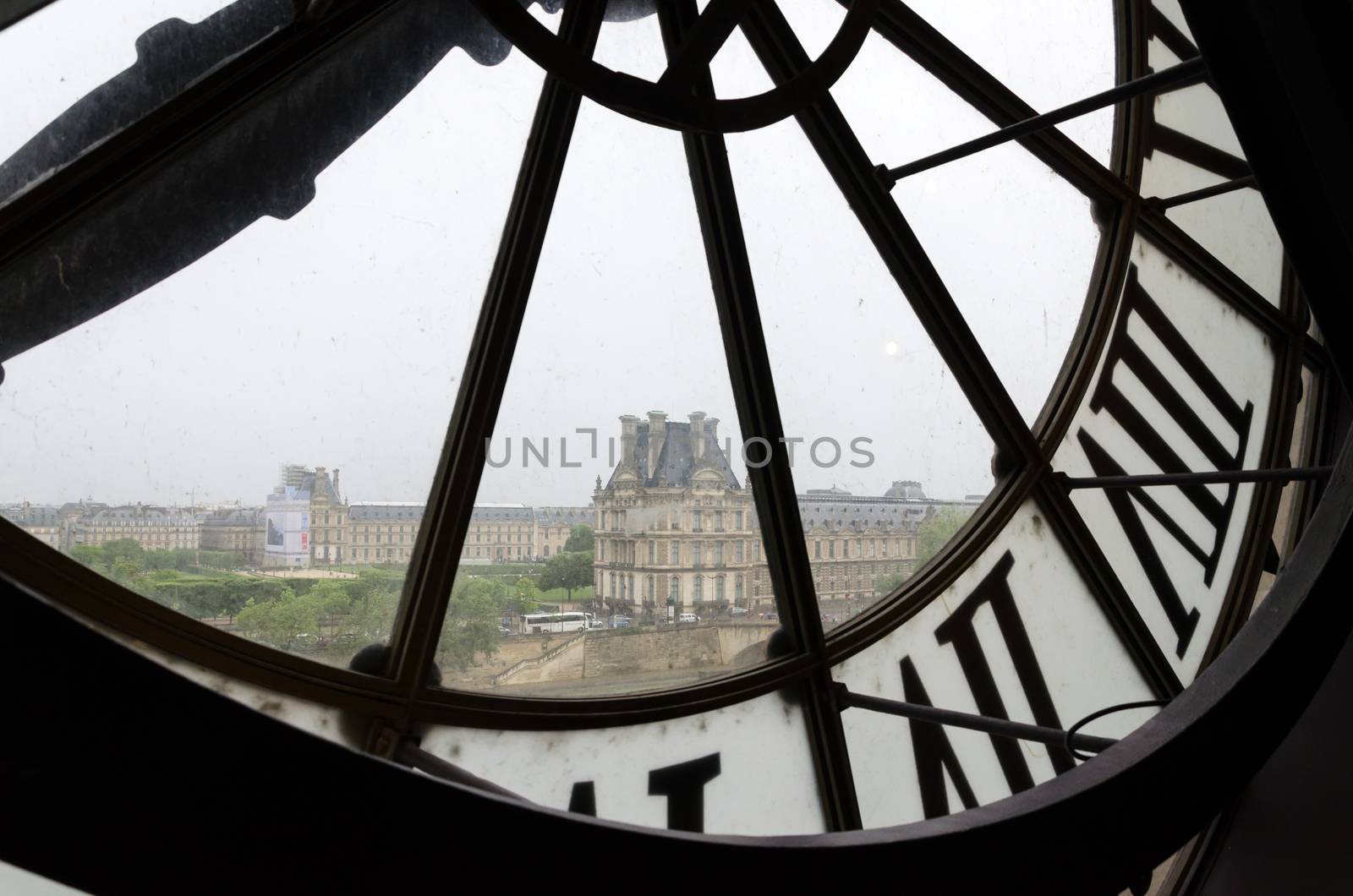 Large clocks with roman numerals in Museum d'Orsay by siraanamwong