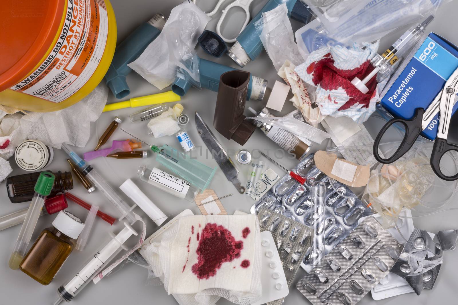 Hazardous medical waste that needs to be carefully disposed of by incineration. Items include clinical waste such as used syringes and needles, used swabs, plasters and bandages. Used drug blister packs and ampules. Biomedical waste is potentially infectious.