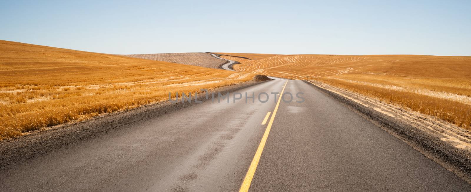 Open Road Two Lane Highway Oregon Landscape Harvested Farmland by ChrisBoswell