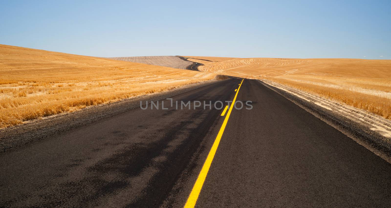 Open Road Two Lane Highway Oregon Landscape Harvested Farmland by ChrisBoswell