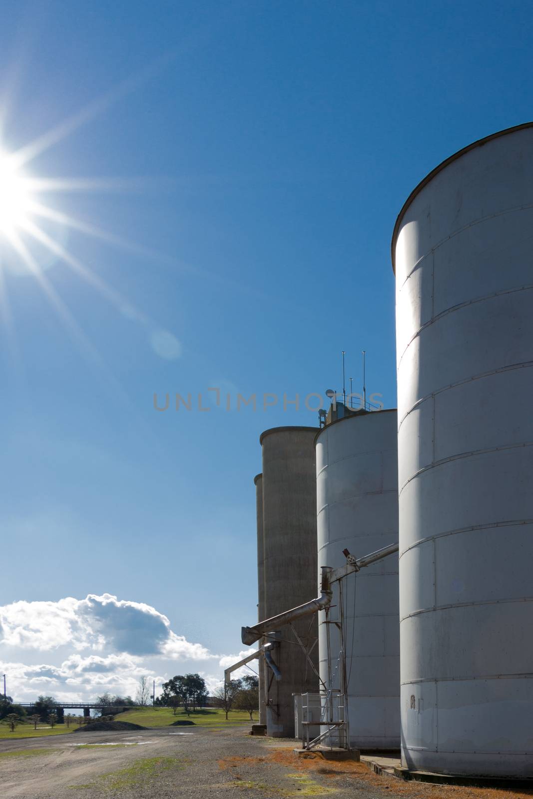 Silos on Blue Sky by davidhewison