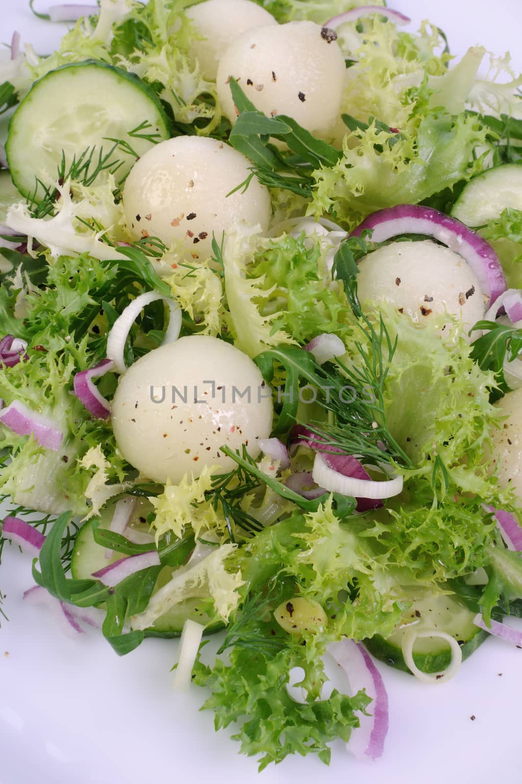 Melon salad with arugula and cucumber by Apolonia