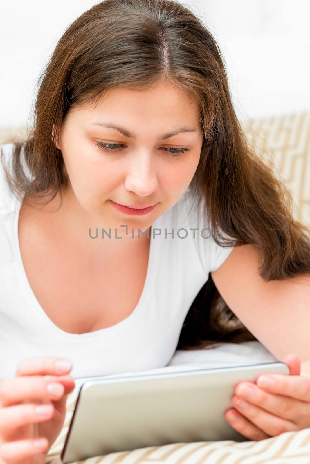 portrait of a girl with tablet computer in hands by kosmsos111