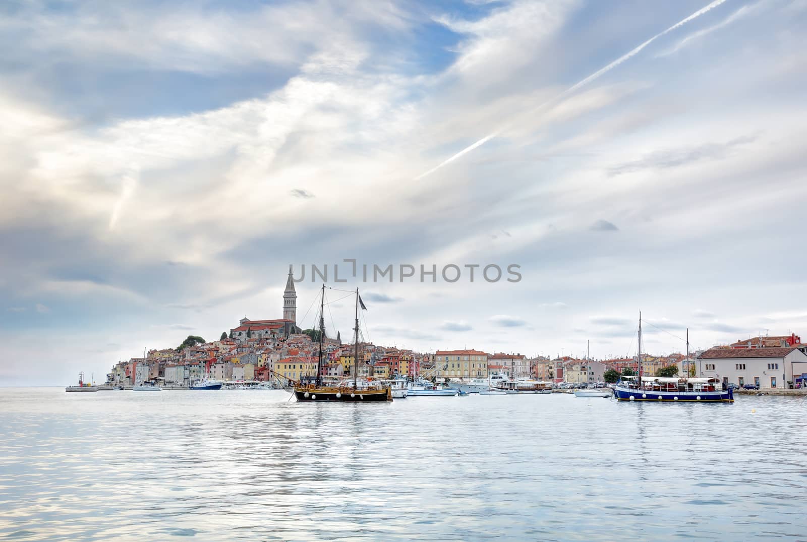 Late afternoon in the old Istrian town of Rovinj or Rovigno in the Adriatic Sea of Croatia with the Saint Euphemia's Basilica dominating the town.