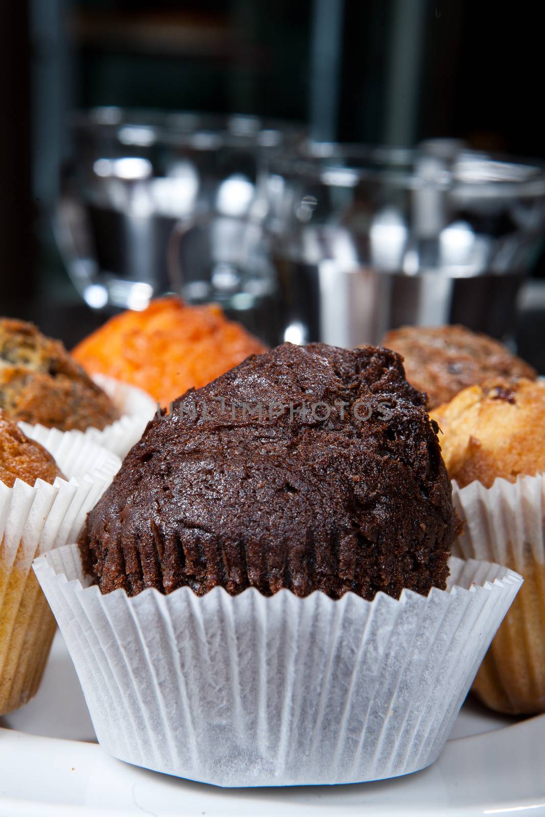 Different kinds of muffins on the kitchen table
