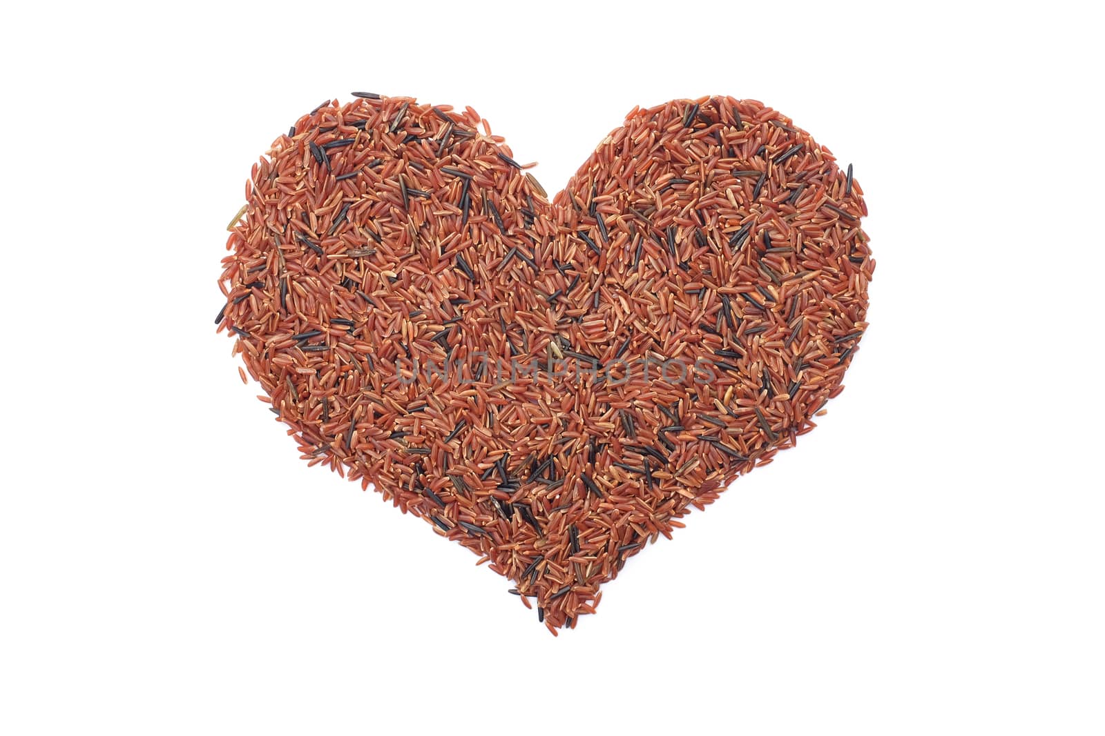 Red camargue rice in a heart shape, isolated on a white background