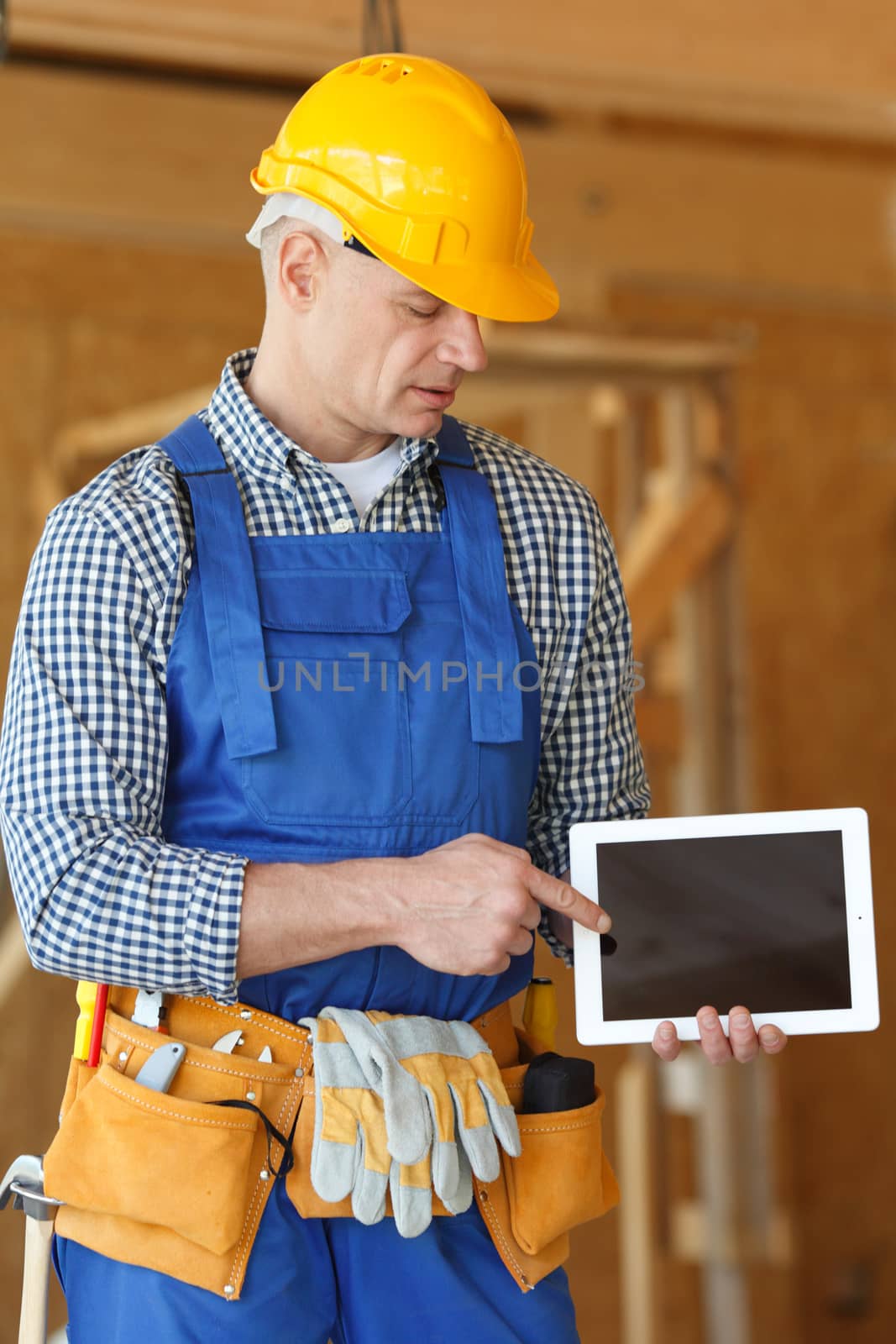 workman with tablet  by ALotOfPeople