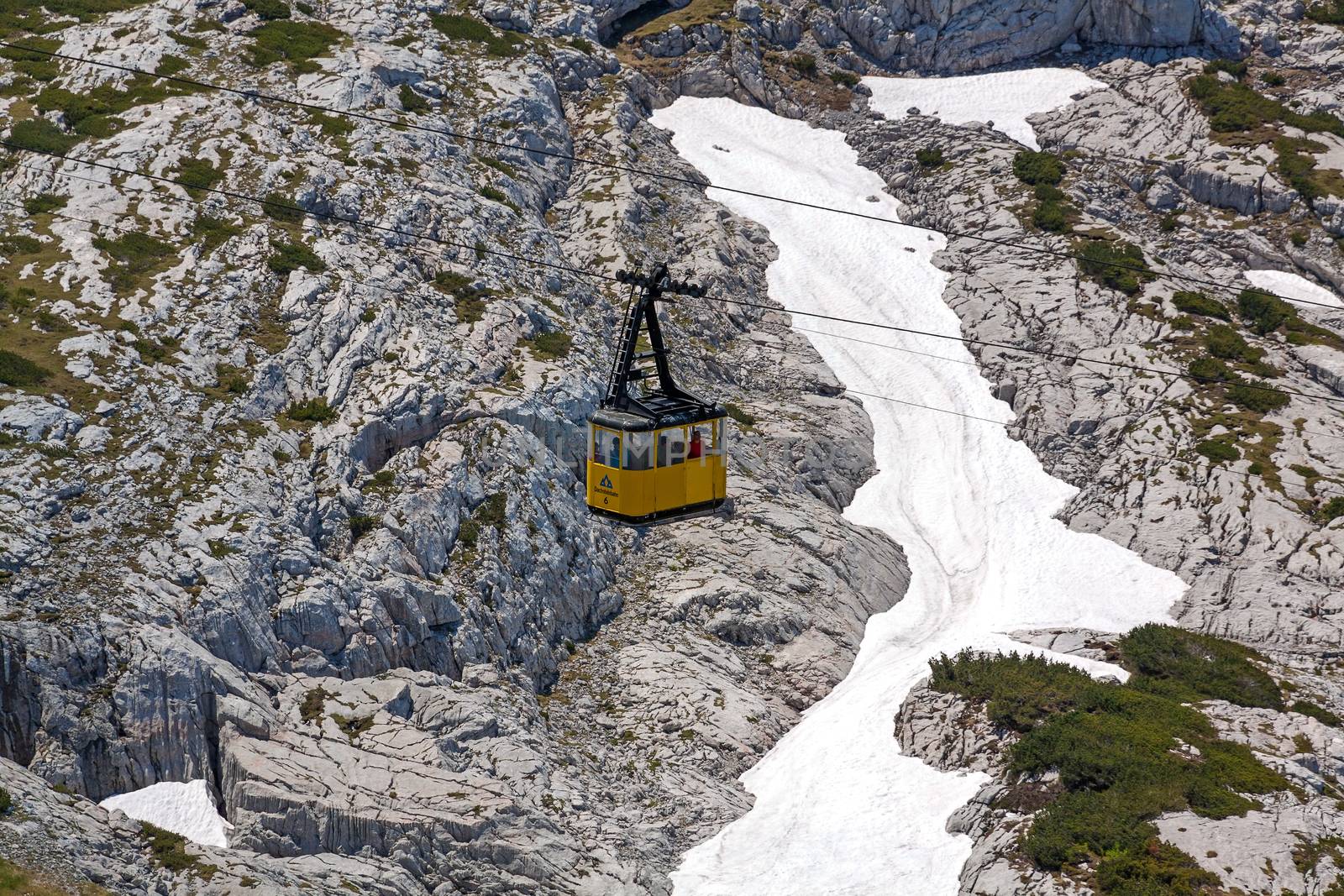 Obertraun, Austria - June 27, 2014: Ropeway gondola at Dachstein mountains, a famous tourist destination of Salzburger Land for hikers.