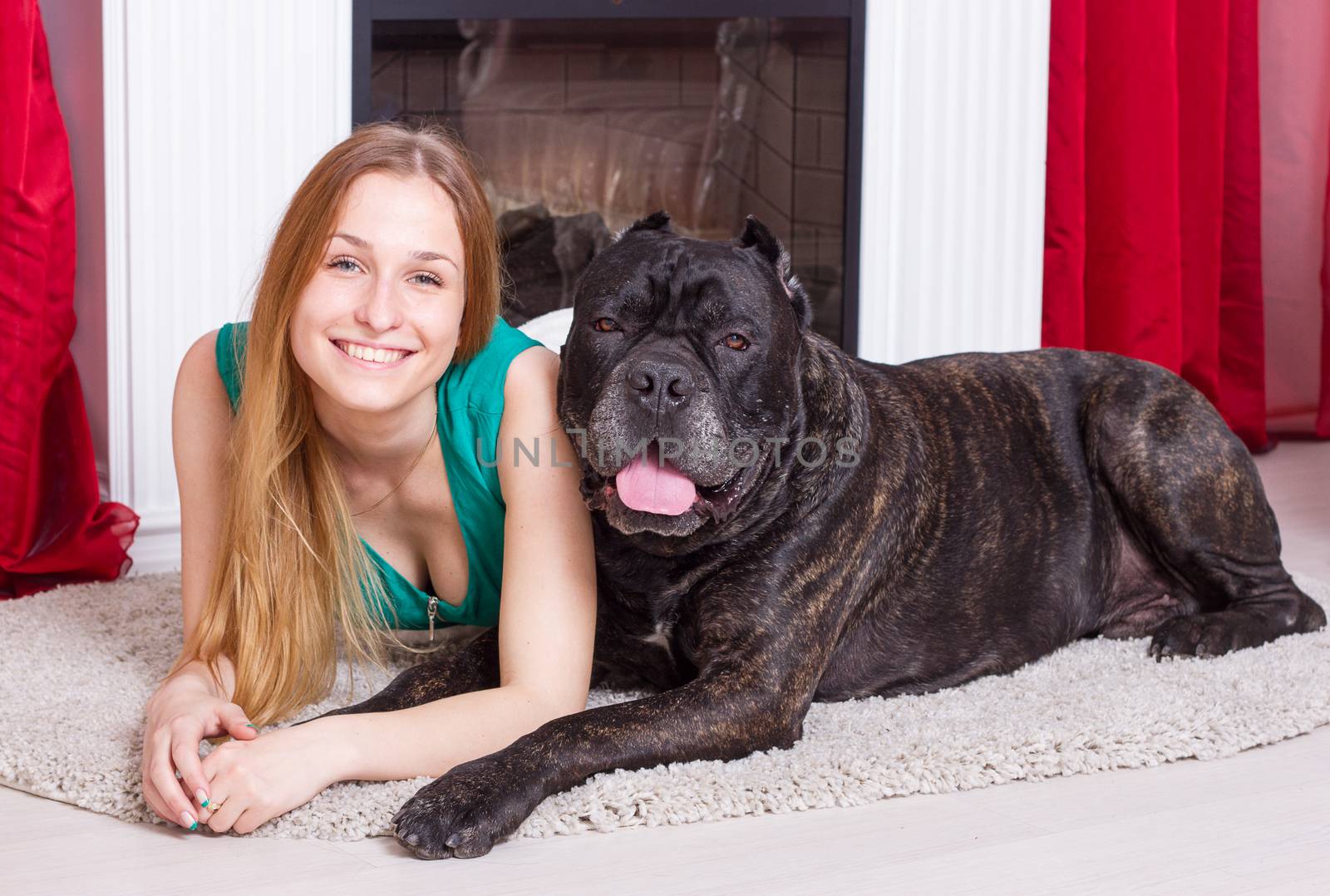 girl is at home with his dog Cane Corso by victosha