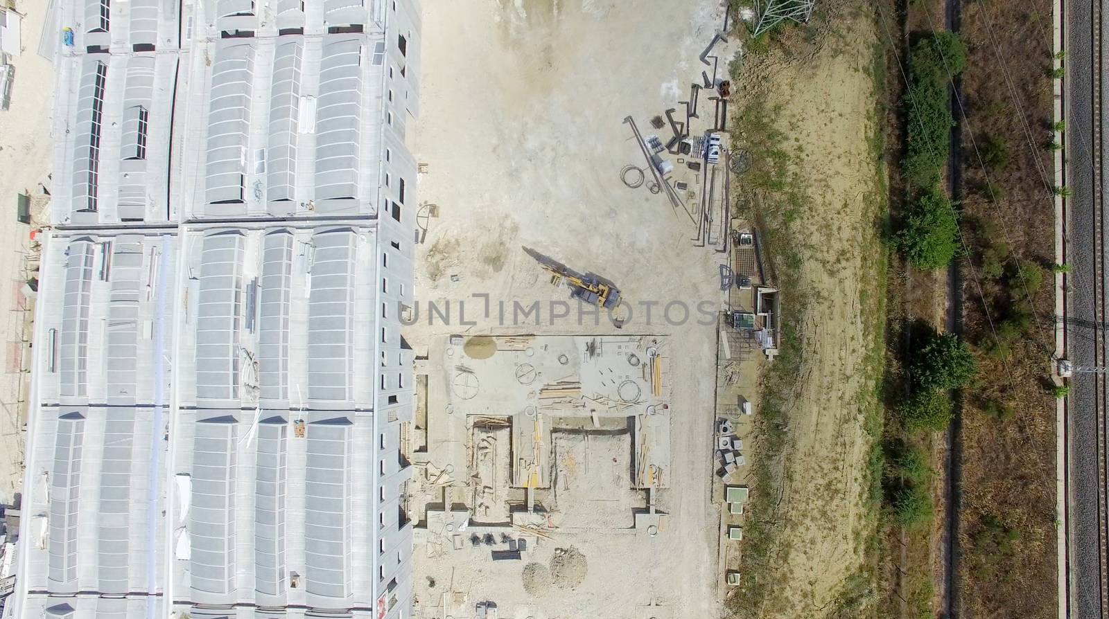 Building construction site, overhead view.