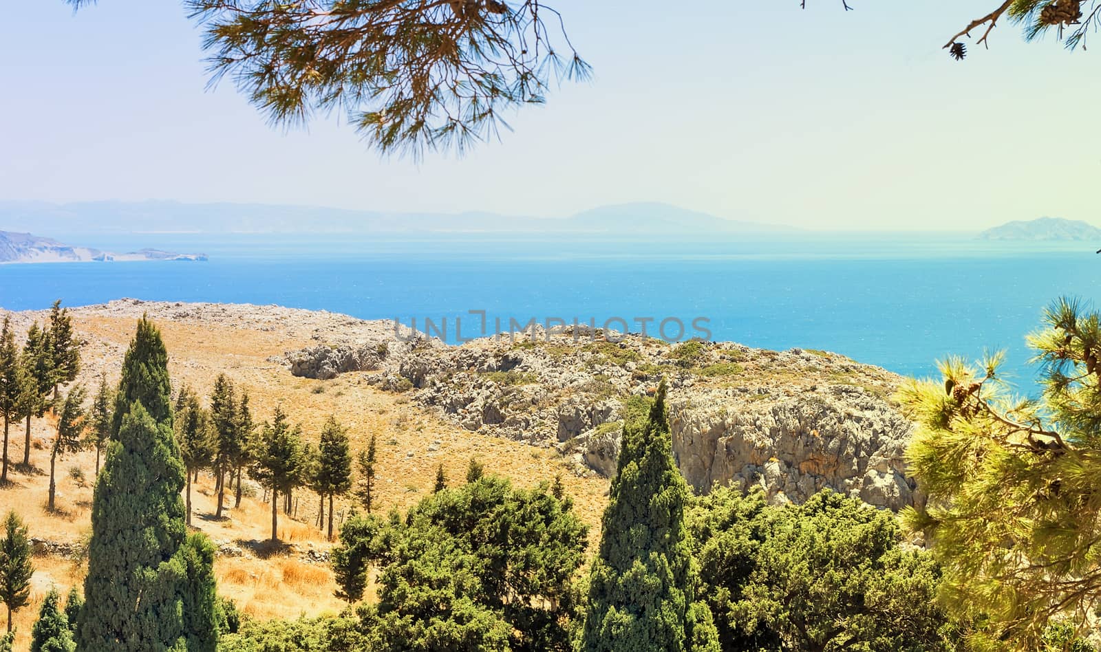 Beautiful summer landscape with sea and mountain views with vegetation. The Island Of Crete, Greece.