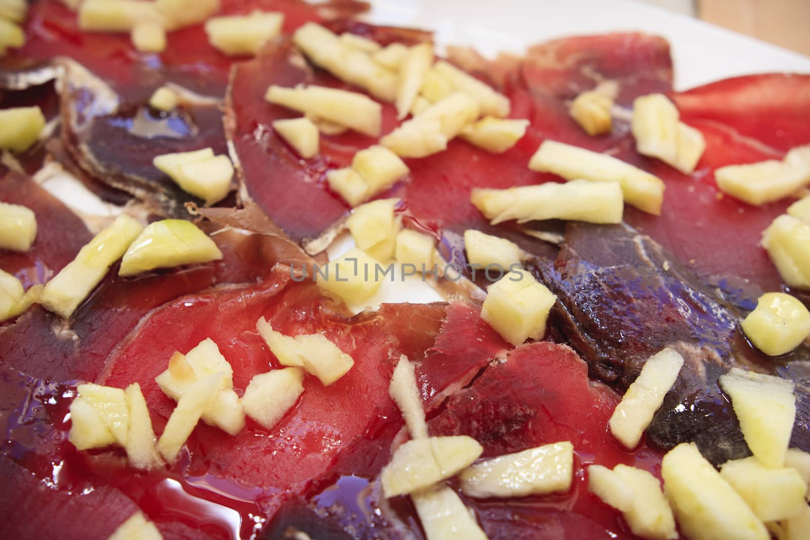 spanish ham jamon served with pieces of melon