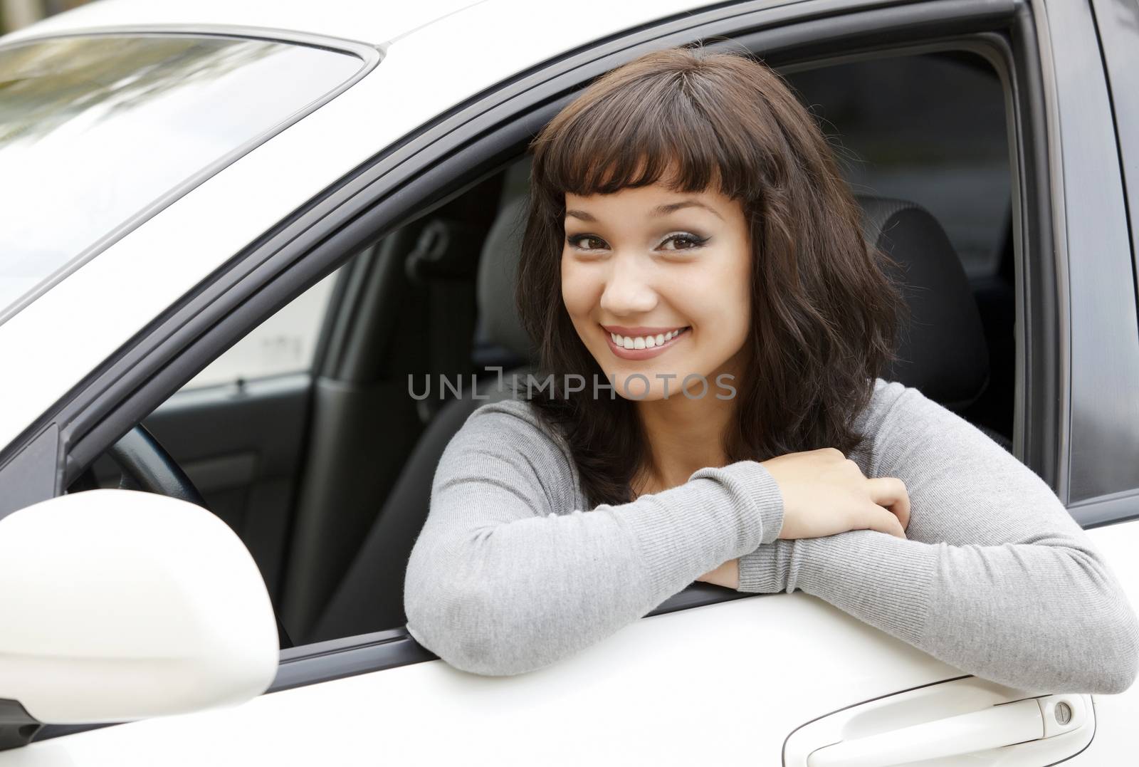 Pretty girl in a car