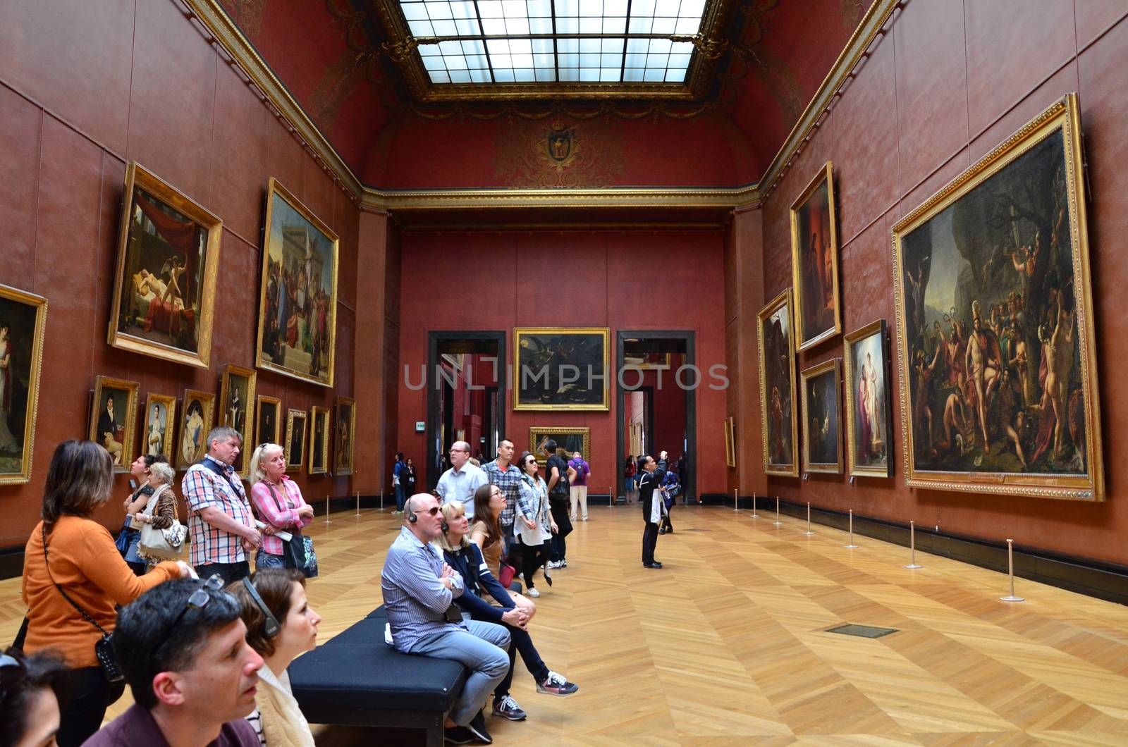 Paris, France - May 13, 2015: Visitors visit Rubens paintings in Louvre Museum by siraanamwong